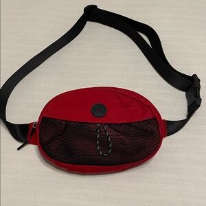 Lululemon Rare Take It On Belt Bag in dark red and black zip for closing